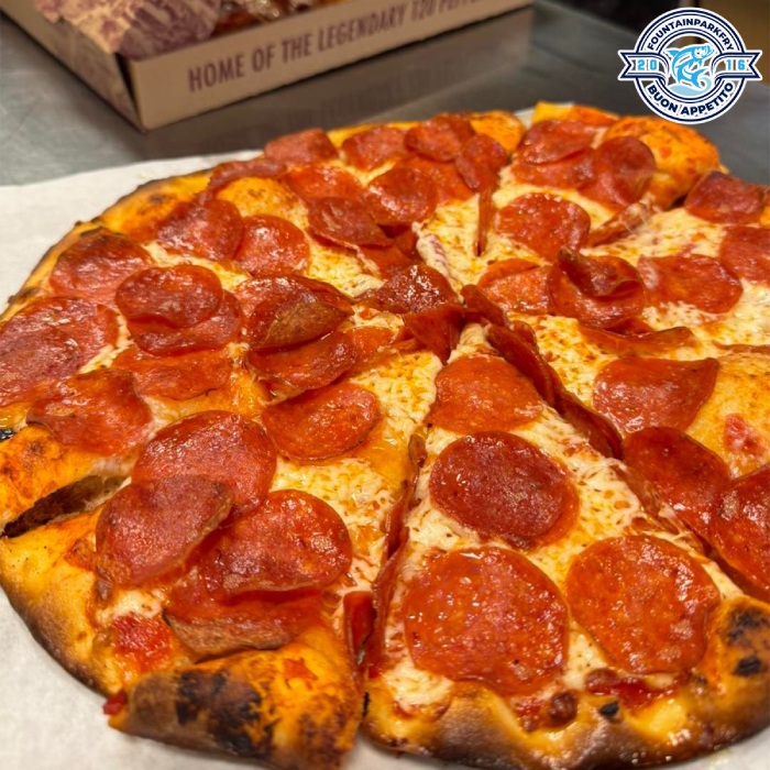  Freshly Made Pizzas Served on a Wooden Plate at Fountain Park Fry Edinburgh 